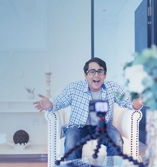 Surprised Man sitting on the armchair 